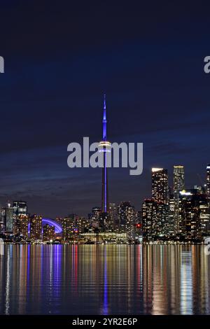 Toronto CN Tower illuminated at night Stock Photo - Alamy