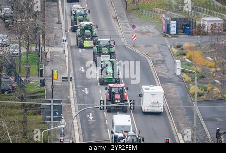 Dresden, Germany. 02nd Dec, 2024. Saxon farmers drive with tractors on Magdeburger Straße to the state parliament to hand over a letter of protest to the state government. The farmers demand the renegotiation of the Mercosur agreement and the introduction of mandatory origin labeling for all foodstuffs. Credit: Robert Michael/dpa/Alamy Live News Stock Photo