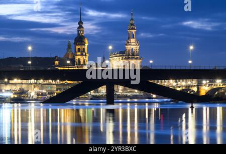 Dresden, Germany. 02nd Dec, 2024. Evening view of the collapsed Carolabrücke bridge in front of the historic old town on the Elbe. The western section of the bridge with streetcar tracks, cycle path and footpath collapsed on the night of September 11, 2024 for reasons as yet unknown. Credit: Robert Michael/dpa/Alamy Live News Stock Photo