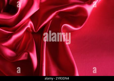 Ripples in red silk fabric Stock Photo