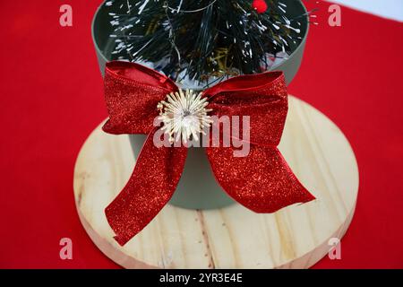 Christmas decoration with red table and wooden structure Stock Photo