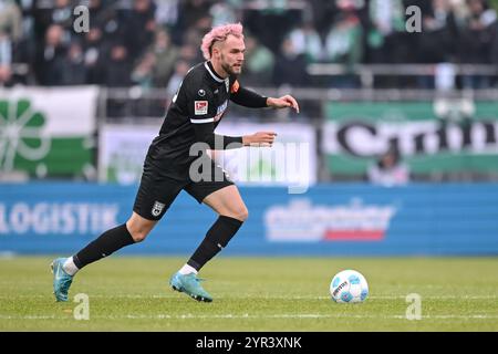 Ulm, Germany. 01st Dec, 2024. Soccer: Bundesliga 2, SSV Ulm 1846 - SpVgg Greuther Fürth, Matchday 14, Donaustadion. Ulm's Philipp Strompf in action. Credit: Harry Langer/dpa - IMPORTANT NOTE: In accordance with the regulations of the DFL German Football League and the DFB German Football Association, it is prohibited to utilize or have utilized photographs taken in the stadium and/or of the match in the form of sequential images and/or video-like photo series./dpa/Alamy Live News Stock Photo