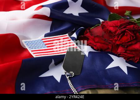 Veterans day. Army token, American flag and roses, closeup Stock Photo ...