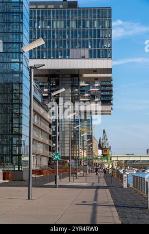 Modern riverside building reflects contemporary architecture in a ...