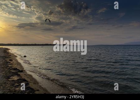 Kitesurfer enjoying the beach during a dramatic sunset by the sea, Zadar, Croatia, Europe Stock Photo