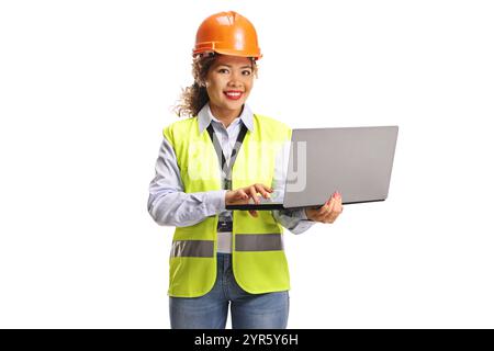 Female asian engineer with a hardhat holding a laptop computer isolated on white background Stock Photo