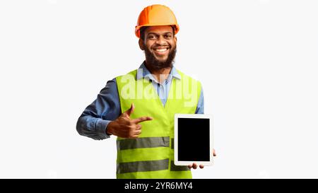 Builder Worker Showing Digital Tablet Empty Screen, Panorama, Studio Shot Stock Photo