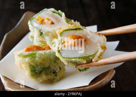 Deep-fried scallop with sea urchin Stock Photo