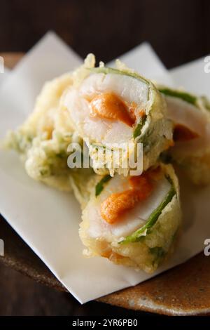 Deep-fried scallop with sea urchin Stock Photo