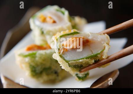 Deep-fried scallop with sea urchin Stock Photo