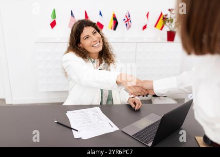 Businesswomen collaborating and networking in a modern office environment Stock Photo