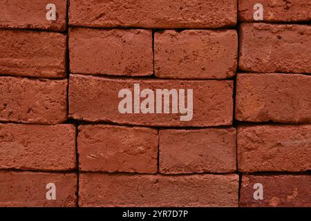 A close up surface view of newly stacked bricks at a construction site. Stock Photo