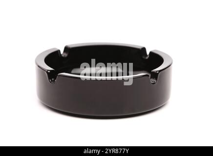 Empty black ceramic ashtray isolated on white Stock Photo
