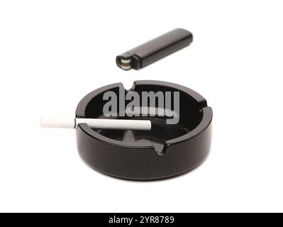 Black ceramic ashtray cigarette lighter. White background. Stock Photo