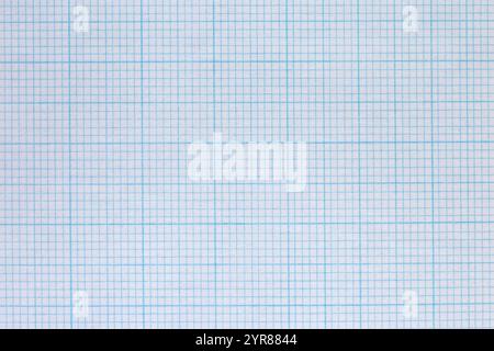 Graph paper notebook sheet background backdrop used in mathematics, architecture and science for drawing to scale. Stock Photo