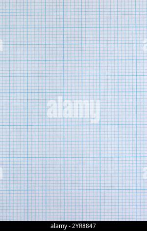 Graph paper notebook sheet background backdrop used in mathematics, architecture and science for drawing to scale. Stock Photo