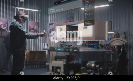 Modern workshop: Professional craftsman or designer wearing AR headset assembles shelf in virtual space using app with AI user interface. 3D animation of holographic furniture. Augmented reality. Stock Photo