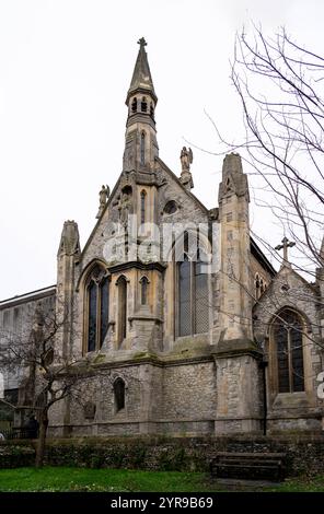 St Thomas of Canterbury Church is a Roman Catholic Parish church in Canterbury, Kent, England. It was built from 1874 to 1875 in the Gothic Revival style. It is situated on the corner of Burgate and Canterbury Lane, west of Lower Bridge Street, opposite the grounds of Canterbury Cathedral in the centre of the city. Canterbury is a city and UNESCO World Heritage Site, in the county of Kent, England; it was a county borough until 1974. It lies on the River Stour. Stock Photo