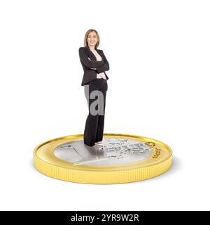 Businesswoman standing on one euro coin symbolizing financial success on white background Stock Photo