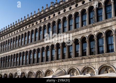 Facade of the Procuratie Vecchie on the north side of St. Mark's Square in Venice, Italy. Stock Photo