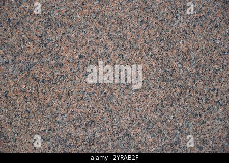 Texture of red polished granite stone with copy space Stock Photo