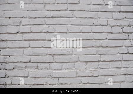 Old brick wall painted white textured backgound Stock Photo