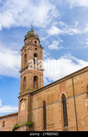 Tower of the historic Pian Mantellini church in Siena, Italy Stock Photo