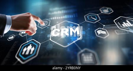Customer relationship management system concept. Businessman touching finger CRM Stock Photo