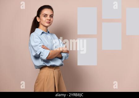 Confident pretty businesswoman near sticky papers on wall, female leader, mock up, Project and schedule concept Stock Photo