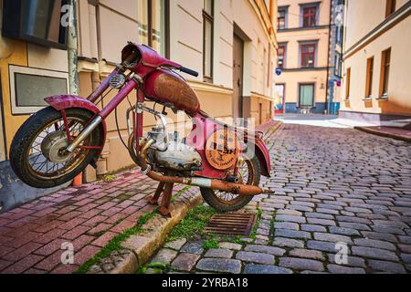 Old rusted abandoned motorcycle in desolate barn Stock Photo - Alamy
