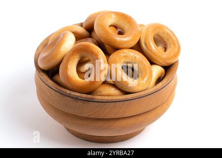 Bagels in wooden bowl on white background, isolated Stock Photo