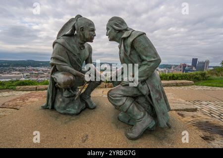 SEPTEMBER 2021, PITTSBURGH, PA, USA - The bronze sculpture, “Point of View,” of Seneca leader Guyasuta meeting George Washington in 1770, overlooks Pittsburgh, PA. Stock Photo