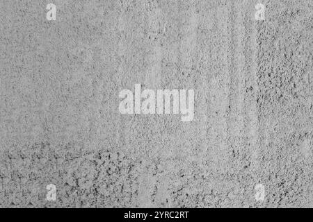 Gray freshly cemented wall close-up. Plaster coating. Stock Photo