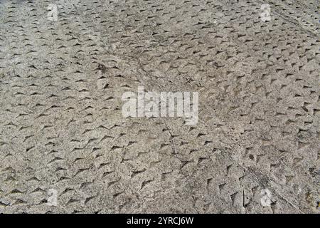 Surface floor with spiked cement to prevent slipping Stock Photo