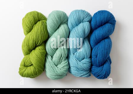 Yarns in different colours on white background. Hobbies and leisure. Stock Photo