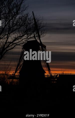 Silhouette of Traditional Dutch Windmill against a deep blue sky Stock ...