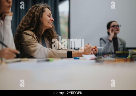 Engaged students participating in an interactive classroom discussion Stock Photo