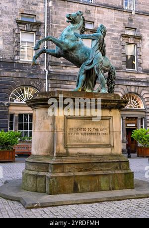 Statue of Alexander and Bucephalus, by John Steell was presented to the city in 1884 and stands outside the City Chambers, Edinburgh, Scotland, UK Stock Photo