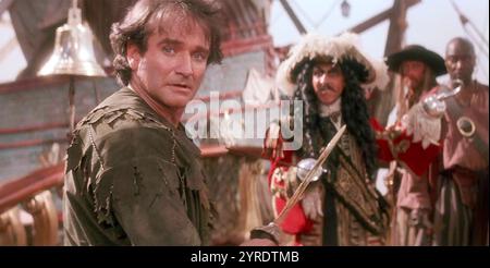 HOOK  1991 TriStar Pictures film with Dustin Hoffman as Captain James Hook at right and Robin Williams as Peter Banning/Peter Pan Stock Photo