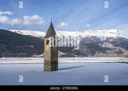 Church tower in Lake Reschen in winter, Reschen Pass, South Tyrol, Italy, Europe Stock Photo