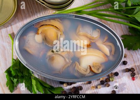 Canned seafood, whole shelled clams Stock Photo