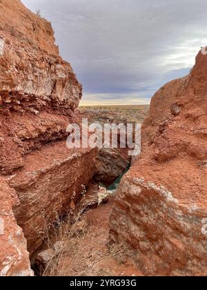 Red rocks leading to a lake in New Mexico Stock Photo