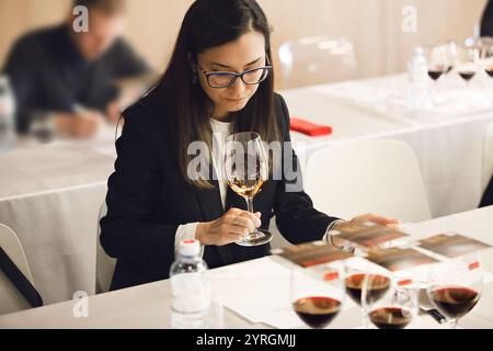 Woman Tasting Various Wines Being in Blind Degustation During Pass Exam for Professional Development Certification Stock Photo