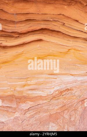 Capture of weathered sandstone showcasing its natural layers and textures The warm earthy tones and intricate patterns highlight geological processes Stock Photo