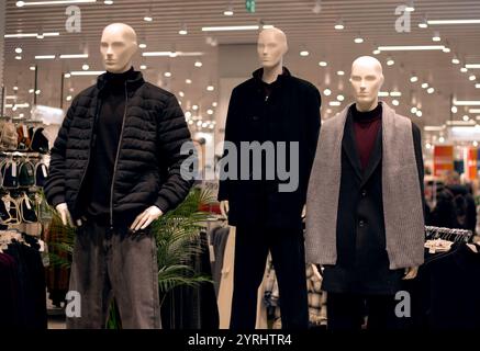 Dressed mannequins in a clothing store Stock Photo