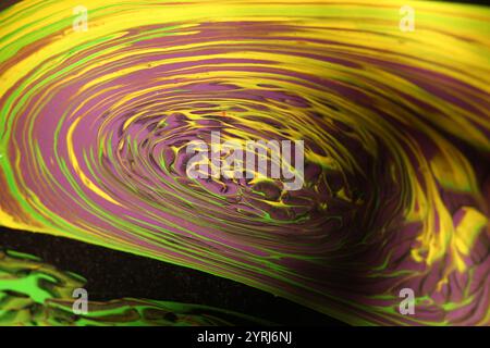 A Vibrant Abstract Swirl of Colors in Continuous Motion and Dynamic Energy Displaying Stock Photo