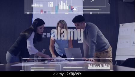 Business team analyzing documents with data visualization image over them Stock Photo