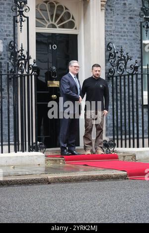 Ukrainian President Volodymyr Zelensky is greeted by Prime Minister Sir Keir Starmer as he arrives in Downing Street. October 10th 2024 Stock Photo