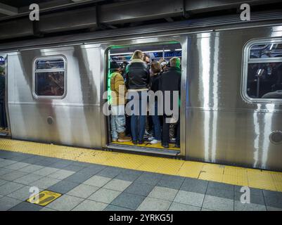 Weekend ridership on the A train at the Canal Street station on the New York subway on Saturday. November 23, 2024. (© Richard B. Levine) Stock Photo