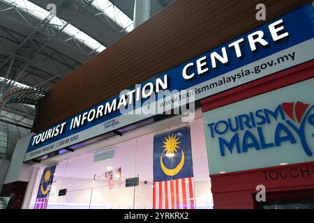 KUALA LUMPUR, MALAYSIA - NOVEMBER 14, 2023: tourist information centre in KL Sentral, Malaysia's main transportation hub, connecting transit options l Stock Photo